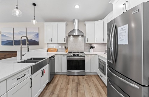 La Follette House | Lakefront home with private hot tub, dock, golf, pool, pickleball, firepit, AC