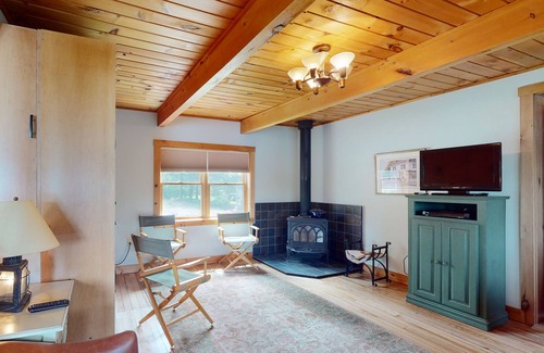 Litchfield Cabin | Lakefront home with firepit, yard, dock/water access, outdoor area, & W/D
