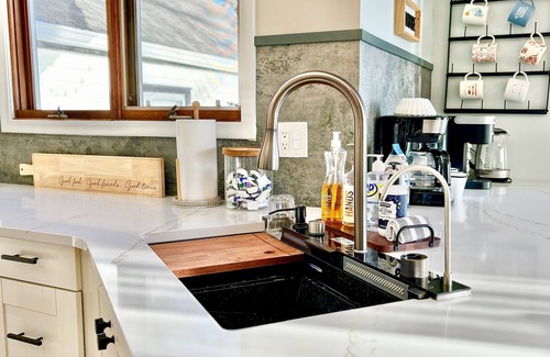 Brooklyn Center Cottage | Lakefront House w/King Bed, Sauna, walk-in shower and lake access