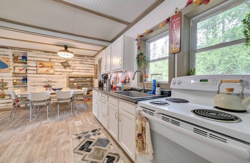 Cheboygan Cottage | Lakefront Michigan Abode w/Deck & Fire Pit!