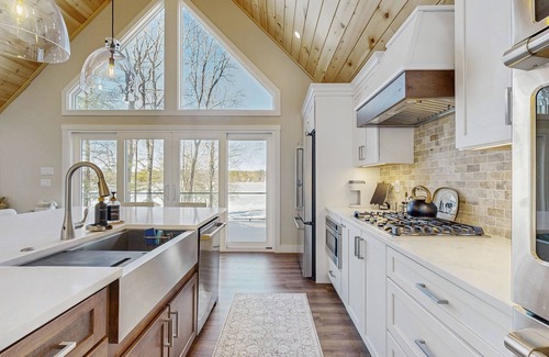 Gray House | Lakefront properties with private beach, hot tub, dock, kayaks, grill & firepit