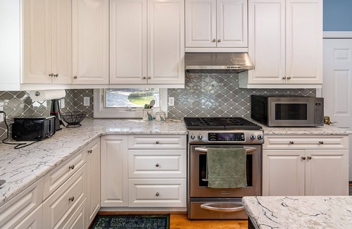 Mayhew House | Lakefront Retreat, with private boat dock, beautiful open water view