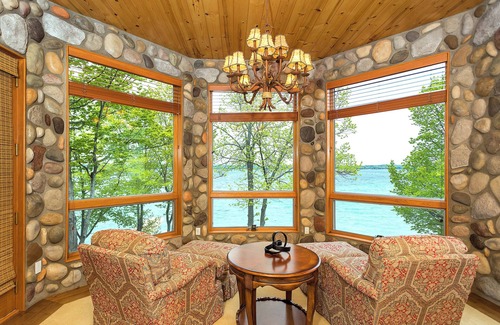 Kewadin House | Lakefront Torch Lake Lodge - 4 Floors of Luxury, Nearby Premier Golf Courses
