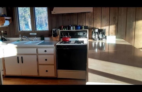 Mercer House | Lakefront vacation home with 300 ft. of private, South West facing, shoreline.