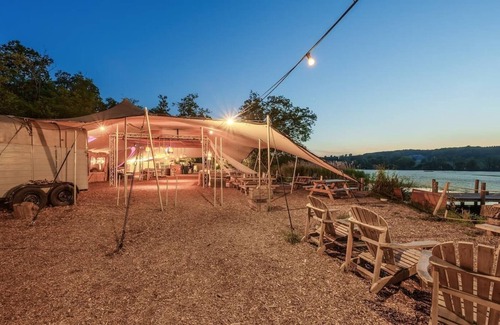 Nunney RV Rental | Lakeside Bell Tent - Canvas Suite at Marston Park
