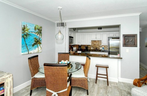 Longboat Key Apartment | LaPlaya 104A- Gulf front! Walk right from your lanai onto the private beach.