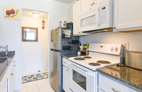 Caine Woods Condo | Large 2 Bedroom 2 bath condo featuring pool, tennis, WiFi, Picnic area w/grill