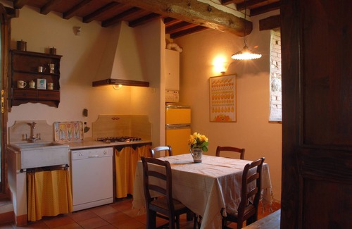 Radicofani Apartment | Large apartment with garden in an old farmhouse with swimming pool