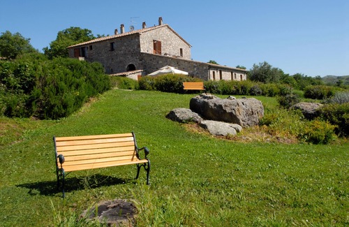 Radicofani Apartment | Large apartment with garden in an old farmhouse with swimming pool