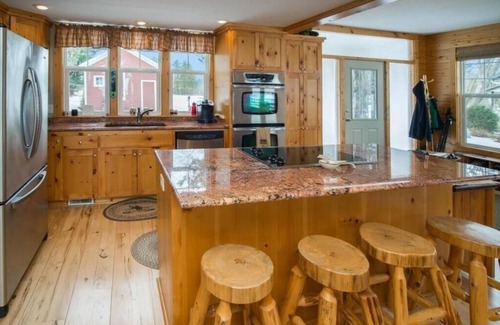 Clear Lake House | Large Family Lake Oasis with exquisite log furniture charm!