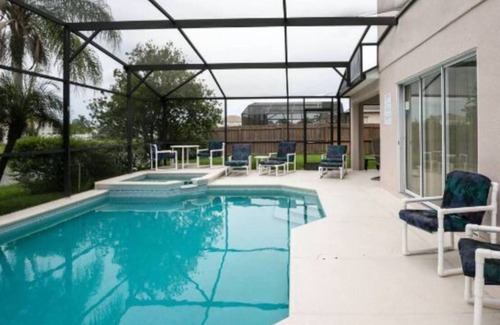 Crescent Lakes Villa | Large Kissimmee Lakeside Villa with South Facing Pool and Spa