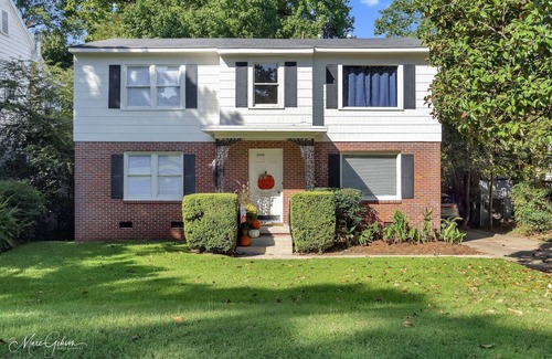 Caddo Heights-South Highlands Apartment | Large windows overlooking streets of historic South Highlands makes this cozy!
