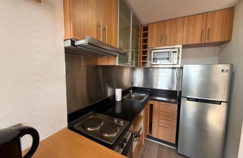El Golf Apartment | Las Condes Skyline Steps from Parque Arauco