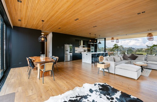El Penol Villa | Legacy Colombia: Modern Waterfront Luxury + Tennis