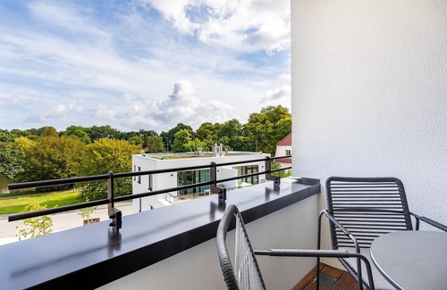 Alt-Travemunde/Ronnau Apartment | Liebevoll Eingerichtetes Apartment in Ostseenähe mit Loggia und Tollem Parkblick