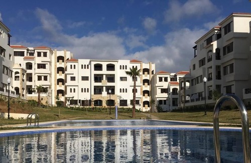 Cabo Negro Apartment | Lilac's garden Vue piscine
