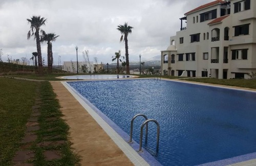 Cabo Negro Apartment | Lilac's garden Vue piscine