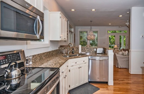 Bald Head Island Cottage | Live oak views from this 3 bedroom cottage; 2 golf carts and peaceful screened in porch