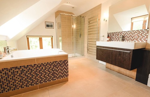 Llanddeusant Cottage | Llynon Lodge - a cosy fire that sleeps 4 guests in 2 bedrooms