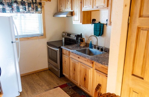 Red River Cabin | Located on the river, facing the Mountains