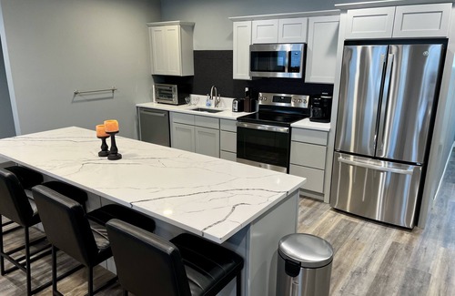 Ishpeming House | LOCATION, LOCATION, LOCATION! Beautiful, newly constructed, spacious retreat