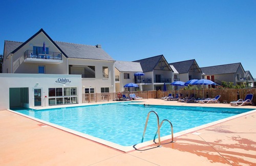 Baden Condo | Location proche de la Plage | Piscine Couverte