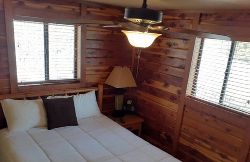 Lake Ozark Cabin | Log Cabin,dock,boat slip, fire pit , and walk to Bagnell