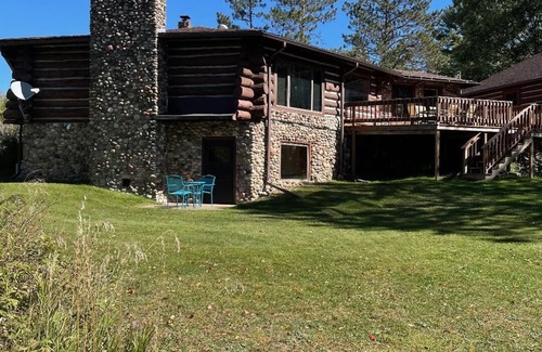 Irma Cabin | Log Cabin on 40 acres with a private lake