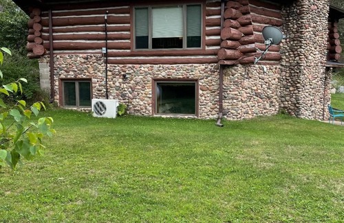 Irma Cabin | Log Cabin on 40 acres with a private lake