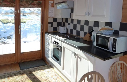 Spittal of Glenshee Cabin | Log Cabin with Hot Tub & Sauna for 4/5 | In the Cairngorm National Park | Great Views