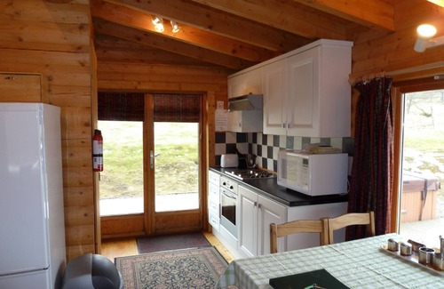 Spittal of Glenshee Cabin | Log Cabin with Hot Tub & Sauna for 4/5 | In the Cairngorm National Park | Great Views