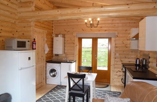 Spittal of Glenshee Cabin | Log Cabin with Hot Tub & Sauna for 2/3 | In the Cairngorm National Park | Great Views