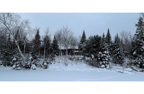 Deer River House | Log Home up nord at da Lake