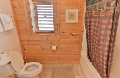 Gatlinburg House | Log Inn, 5 bed 3 bath group cabin in Gatlinburg with game room and hot tub, seasonal resort pool