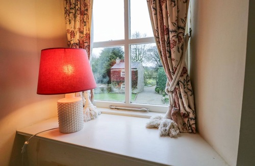 Grange-over-Sands Cottage | LONGLANDS MILKMAID'S PARLOUR, pet friendly, with a garden in Cartmel