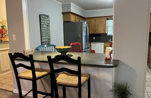 Longview House | Longview family neighborhood., Fenced yard , Equipped for long stays.