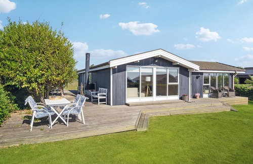 Frørup House | Look forward to a wonderful vacation with sea view in this vacation home.