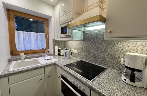 Farchant Apartment | Lovely apartment for 2 guests with WIFI, TV, terrace and parking