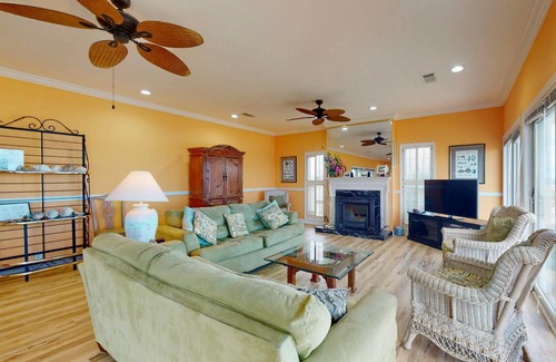 St. George Island House | Lovely Beachfront Plantation home, Pool, Screened Porch, Fireplace, 4BR/3.5BA "Orchid By The Sea"