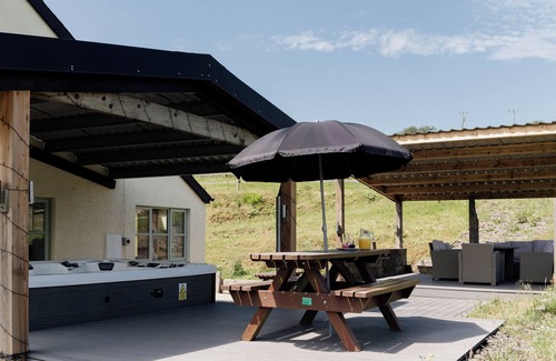 Devils Bridge House | Lovely countryside farm house with large hot tub and disabled friendly. Sleeping 12