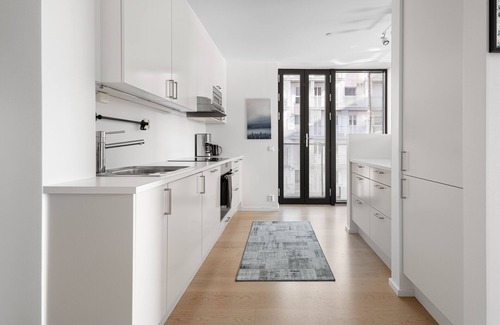 Bjørvika Apartment | Luksuriøs 2BR Leilighet på Central Oslo Barcode