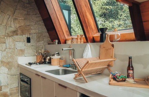 Alto Paraiso de Goias Cabin | Lume Cabin, A-frame cabin that combines comfort and elegance.