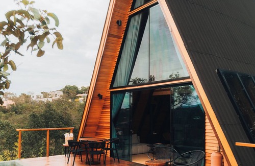 Alto Paraiso de Goias Cabin | Lume Cabin, A-frame cabin that combines comfort and elegance.