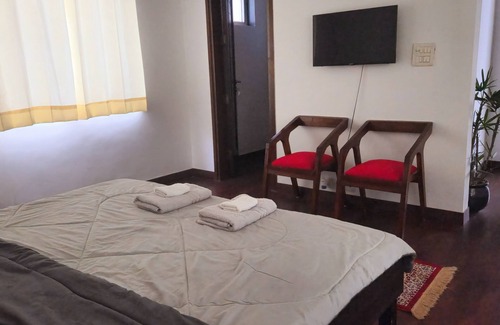 Gurugram Apartment | Luminary Dynasty House Deluxe Room