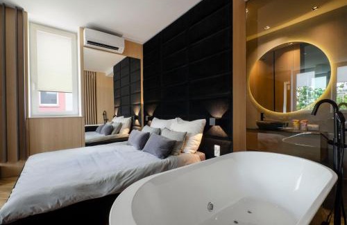 Lodz Apartment | LupoApartments z Klimatyzacją do wyboru z Jacuzzi Pole Dance Parking Dostęp na Kod