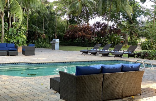 Florida North Atlantic Coast House | Lush gardens on the Earmen River with heated pool
