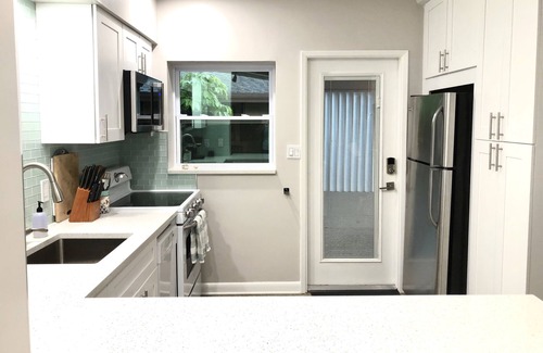 Middle River Terrace House | Lush, Private Retreat with Huge Heated Pool!
