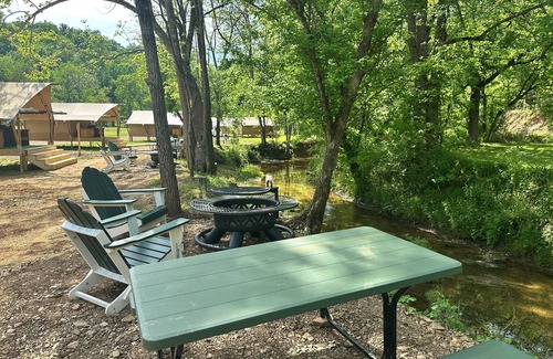 Newport RV Rental | Luxe Creekside Safari Tent|Firepit|HVAC|Spa Bath