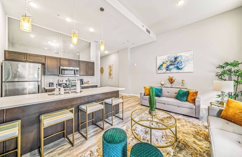 Gateway District Apartment | Luxe Flat w/Heated Pool & Sauna Gym Heart of DT
