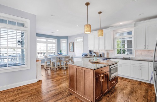 Normandy Beach House | Luxurious 6 bedroom 4.5 bath Waterfront Oasis with Bay Views in Normandy Shores